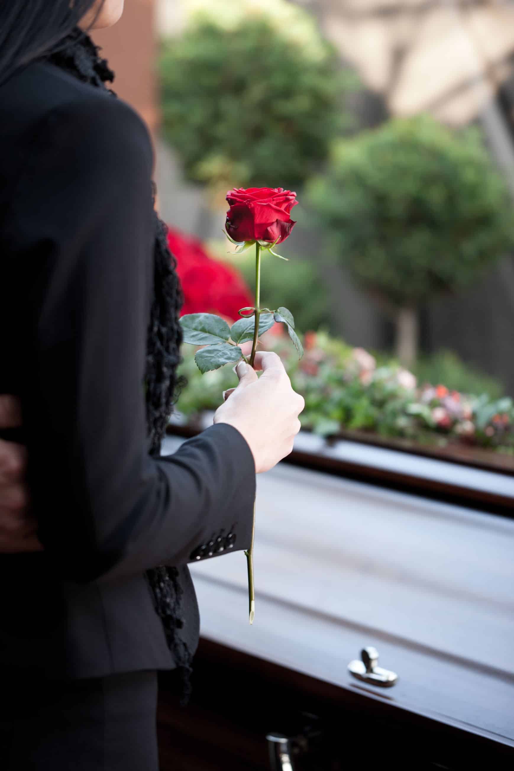 Holding A Rose — Funerals in Sarina, QLD